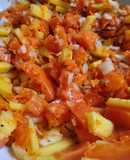 Ensalada de mango, papaya, zanahoria, cebolla, cilantro🥯🧆🥙