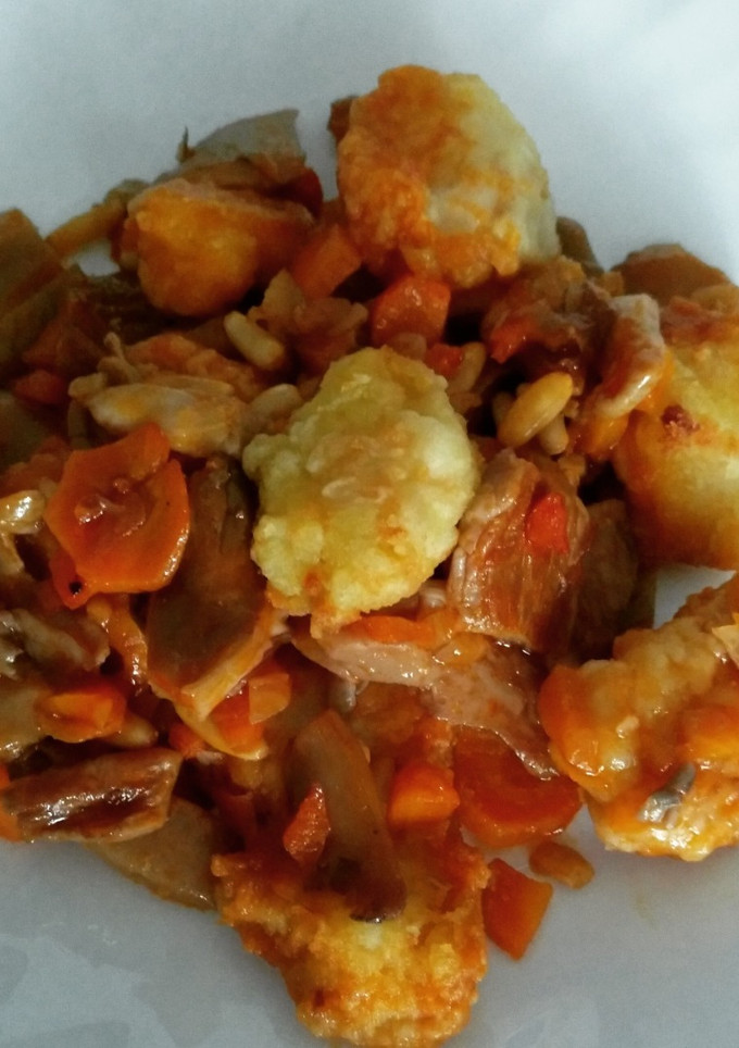 Una foto de Bacalao con setas y piñones
