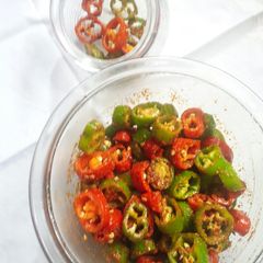 A picture of Red and green chilli pickle.