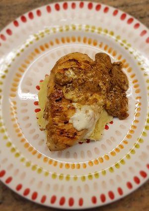 A picture of Chicken breast w/ Mushroom sauce.