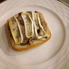 A picture of Bruschetta with Beef and Mushrooms.