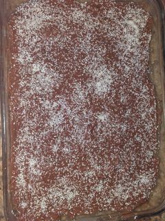 Una foto de Tarta de galletas, con crema pastelera y chocolate