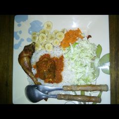 A picture of White rice and stew.