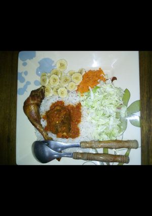 A picture of White rice and stew.