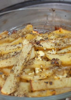 Una foto de Papas asadas con queso
