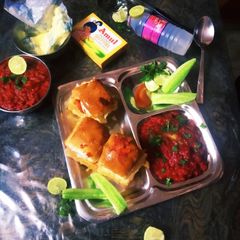 A picture of Buttery Creamy pav baji with masala toast pav.
