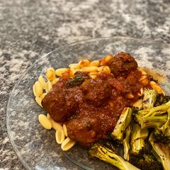 Slow Cooker Meatballs + pasta sauce A picture of Slow Cooker Meatballs + pasta sauce.