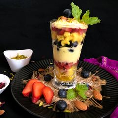 A picture of Sandesh, Fruits & Shrikhand Parfait (Layered Dessert).