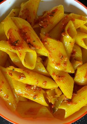 A picture of Red garlic sauce pasta.