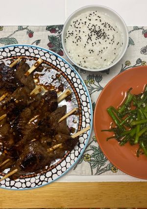 A picture of Garlic Ginger Beef and Broccolini.