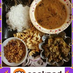 A picture of Sour pulse rice fried beef and coconut chutney(khatti daal Chawal).
