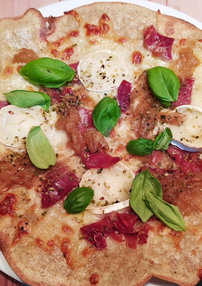 Una foto de Pizza base quinoa