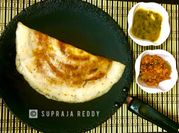 A picture of cheese and paneer dosa