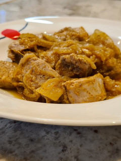 Una foto de Solomillo de cerdo encebollado al pimentón