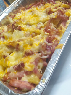 Una foto de Bacon cheese fries estilo Foster's Hollywood