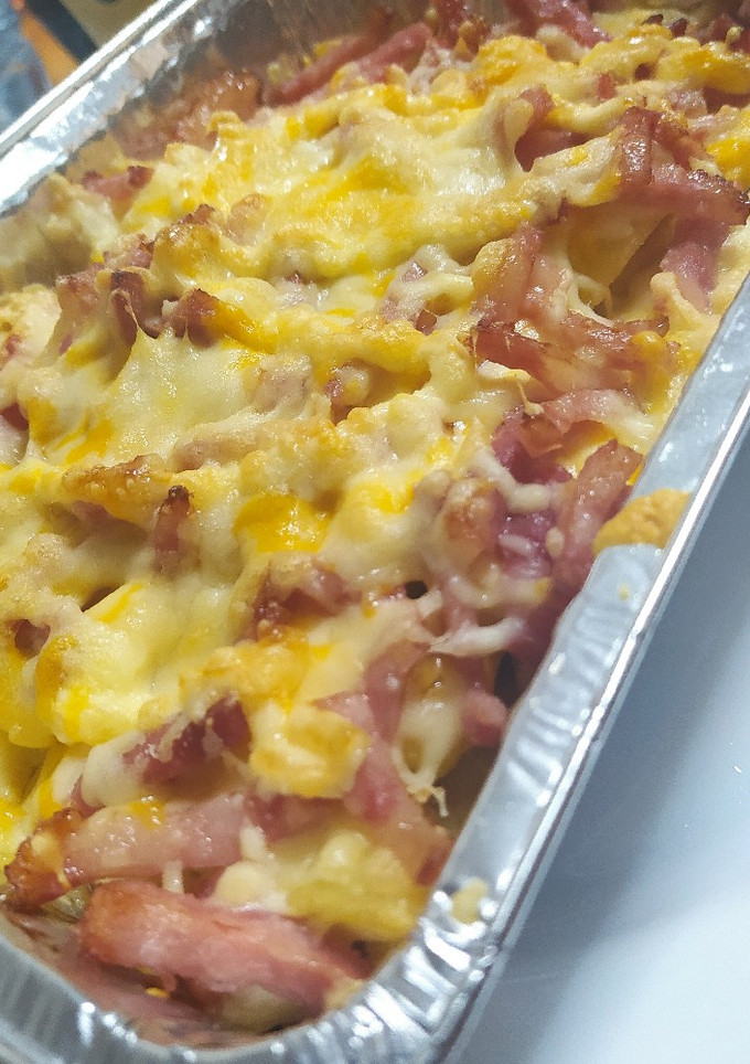Una foto de Bacon cheese fries estilo Foster's Hollywood