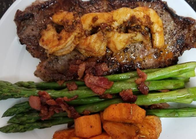 Cajun Shrimp Steak with Honey Glazed Bacon Asparagus