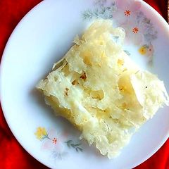 A picture of Chunchi Patra Pitha/Thin paper crust Stuffed Pancake.