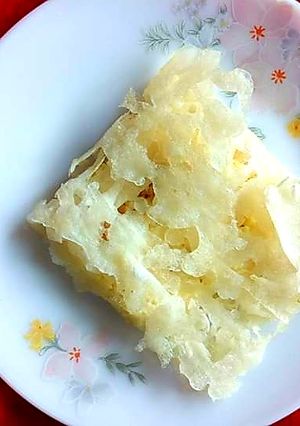 A picture of Chunchi Patra Pitha/Thin paper crust Stuffed Pancake.