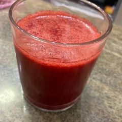 A picture of Fresh carrot apple and raddish juice.
