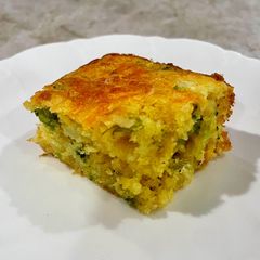 A picture of Cheesy Broccoli Cornbread 🧀🥦.