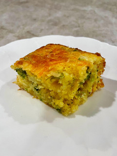A picture of Cheesy Broccoli Cornbread 🧀🥦.