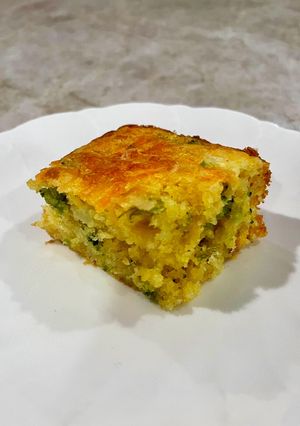 A picture of Cheesy Broccoli Cornbread 🧀🥦.