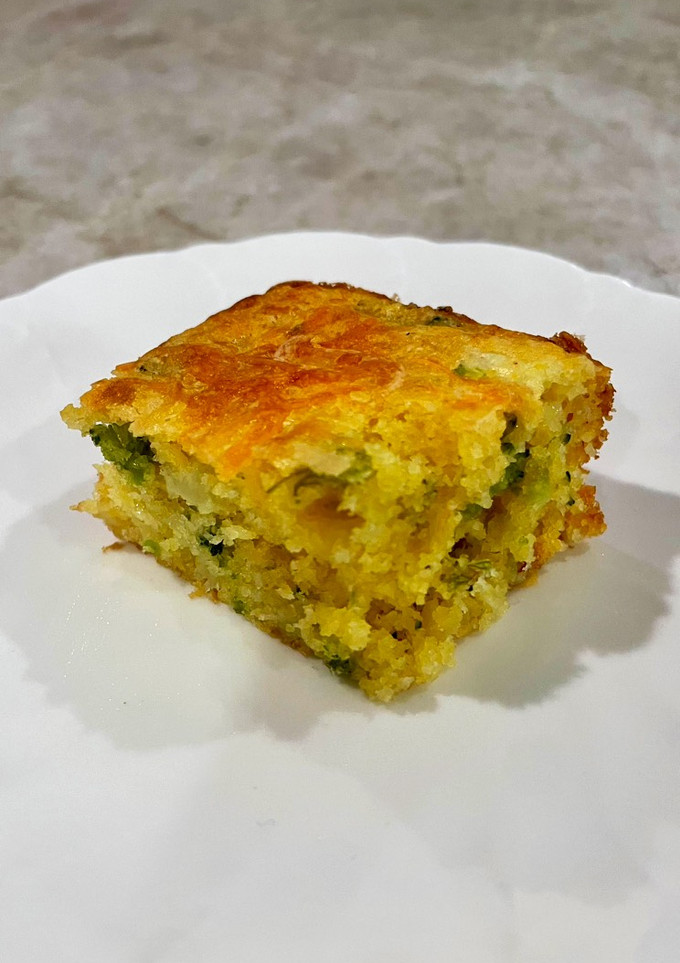 A picture of Cheesy Broccoli Cornbread 🧀🥦.
