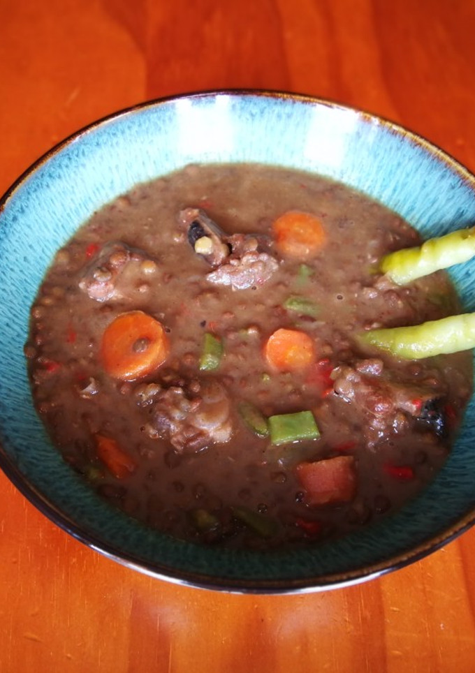 Una foto de Lentejas garam masala con costillas de cerdo