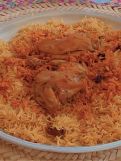 صورة لوصفة رز بخاري على اصوله💯