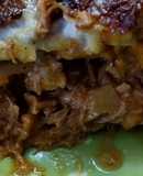 Milhojas de papa y batata (boniato) con carne de cerdo