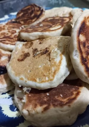 Una foto de Panqueques de banana con arándanos