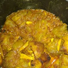 A picture of Aloo potoler dalna (Potatoes and pointed gourd curry).