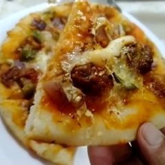 بیف تندوری پیزا A picture of بیف تندوری پیزا.