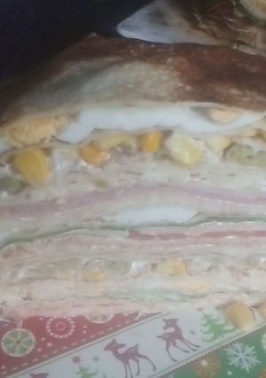 Una foto de Torta salada de panqueques