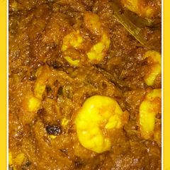 A picture of Taro stem with prawn or chingri mach diye kochur saak.