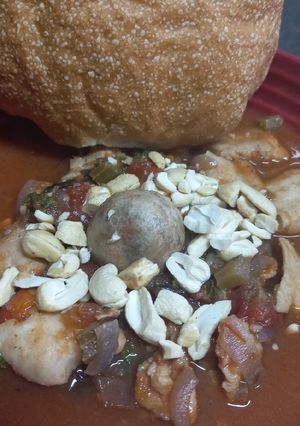 A picture of Sicilian Hake Stew with Raisins and Mushrooms.