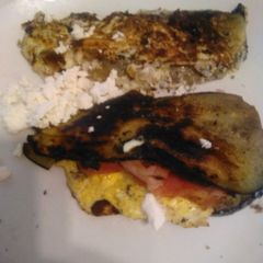 A picture of Aubergine breakfast sandwich.