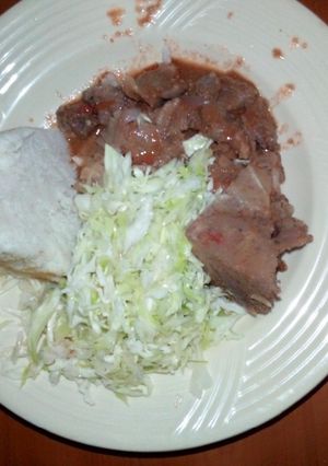 A picture of Beef ugali n steamed cabbage.