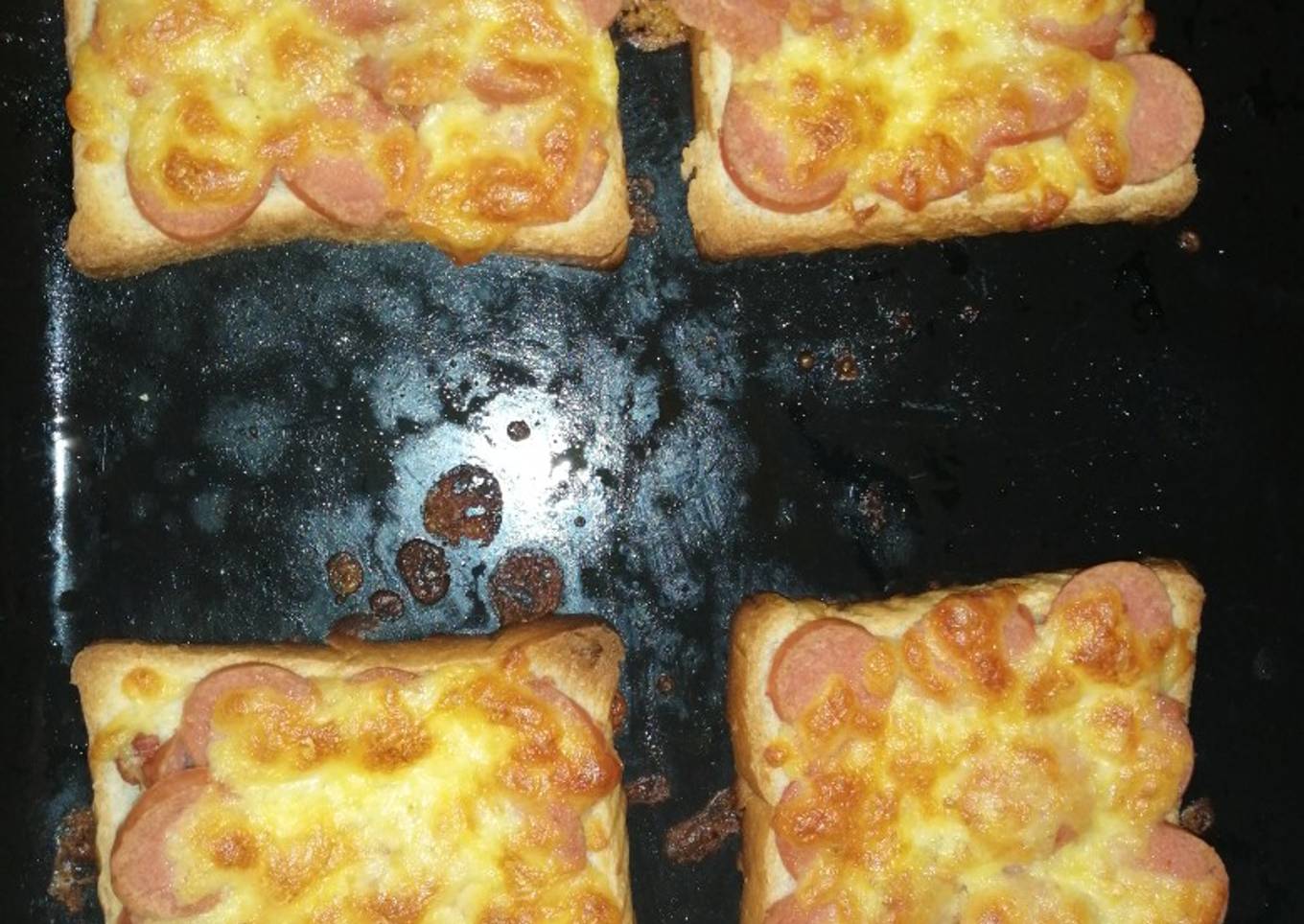 Sausage on bread pizza