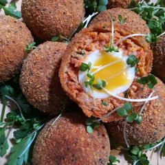 A picture of Scotched Quail Egg with Chorizo.