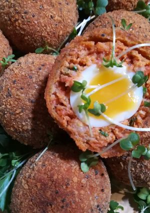 A picture of Scotched Quail Egg with Chorizo.