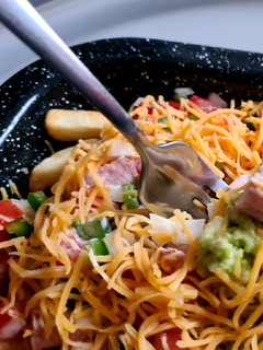 Una foto de Papas fritas cargadas de carne asada (Carne asada fries)