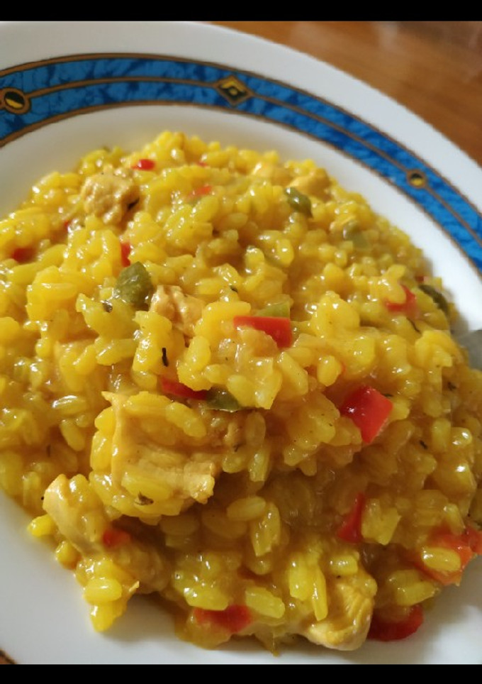 Una foto de Arroz meloso con pollo