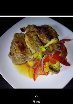 Una foto de Lomo de cerdo con Ensalada Tibia