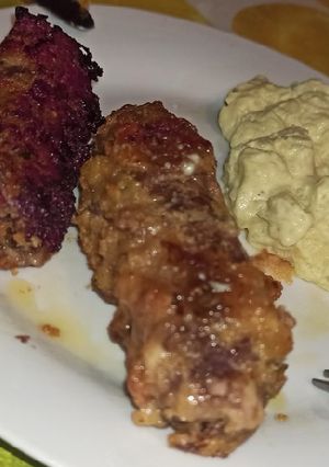 Una foto de Rollitos de ternera, pimiento piquillo y queso semicurado