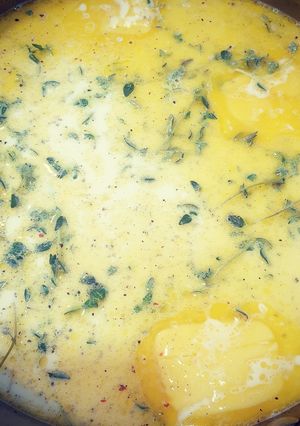 A picture of Poached white fish.
