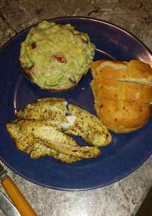 A picture of Portabelo salad w/ tilapia.