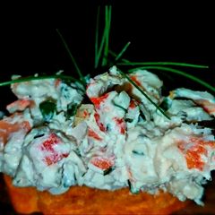 A picture of Mike's Creamy Seafood Spread On Bagels & Crostinis.