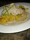 Arroz cremoso con lomo de pescado asado en salsa de Camarones
